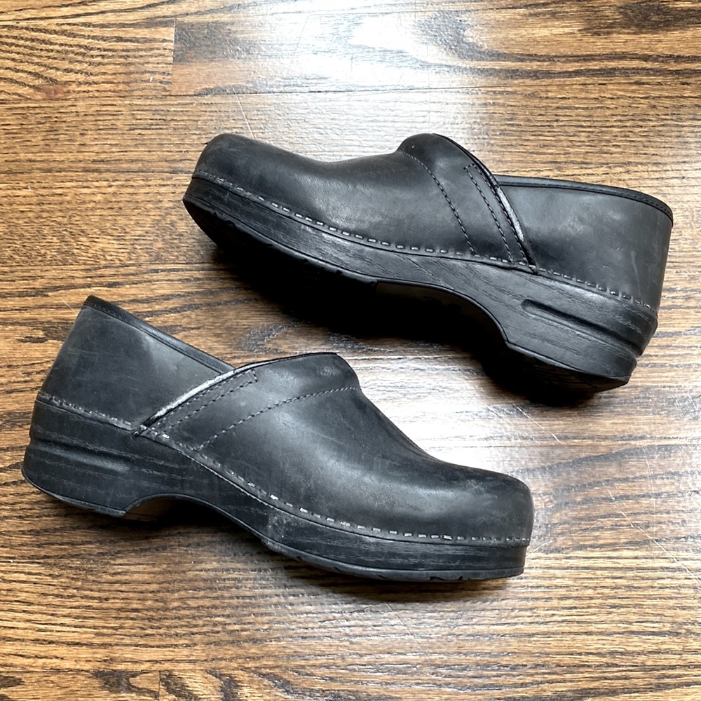 Dansko black leather platform clogs